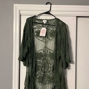 Olive green shawl with flower print. New with tags, perfect for a dressy look.